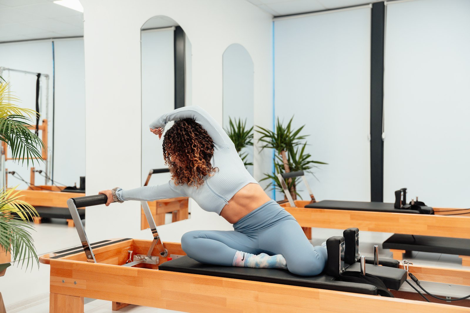 Pilates reformer studio session with grip socks as an application reference